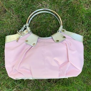 Bobbi by Sharif fancy hobo style handbag with silver hardware and circle grasp